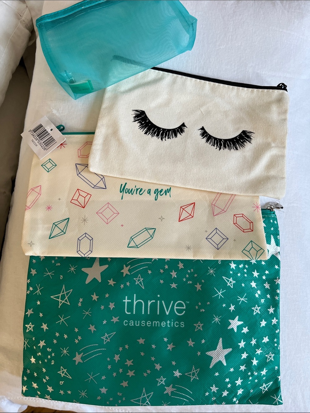 4 cosmetic zippered pouches